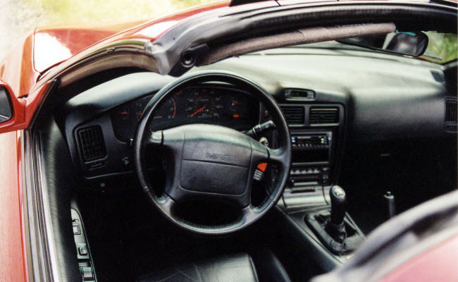 interior as seen through the driver's side window