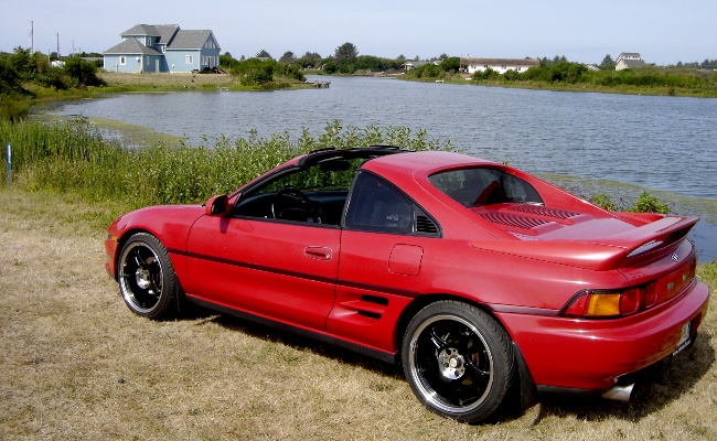 The T-tops are off, as they should be MR2 from side, angled toward rear, T-tops off